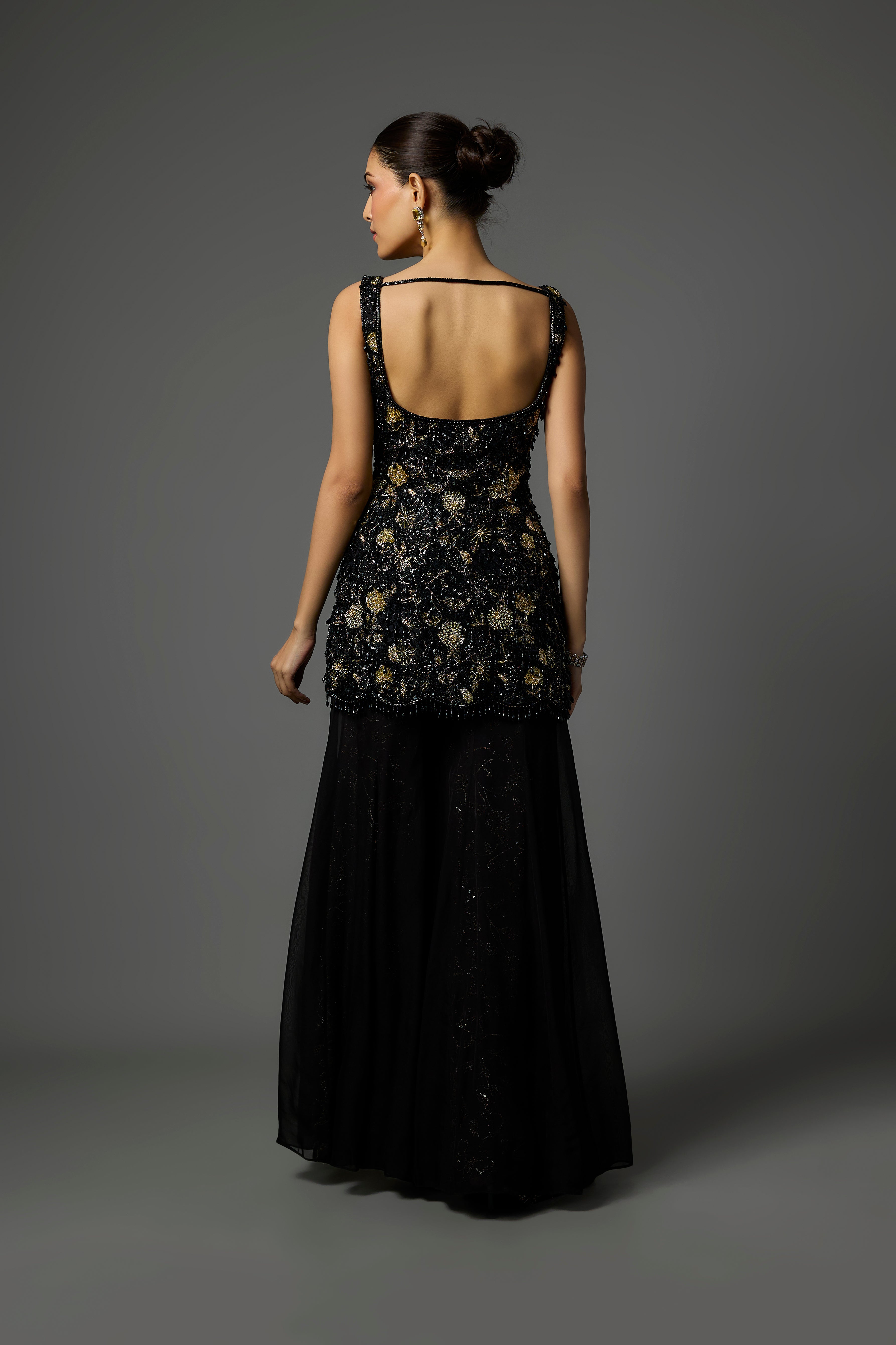 Black Sharara Set Adorned with Intricate Hand Embroidery
