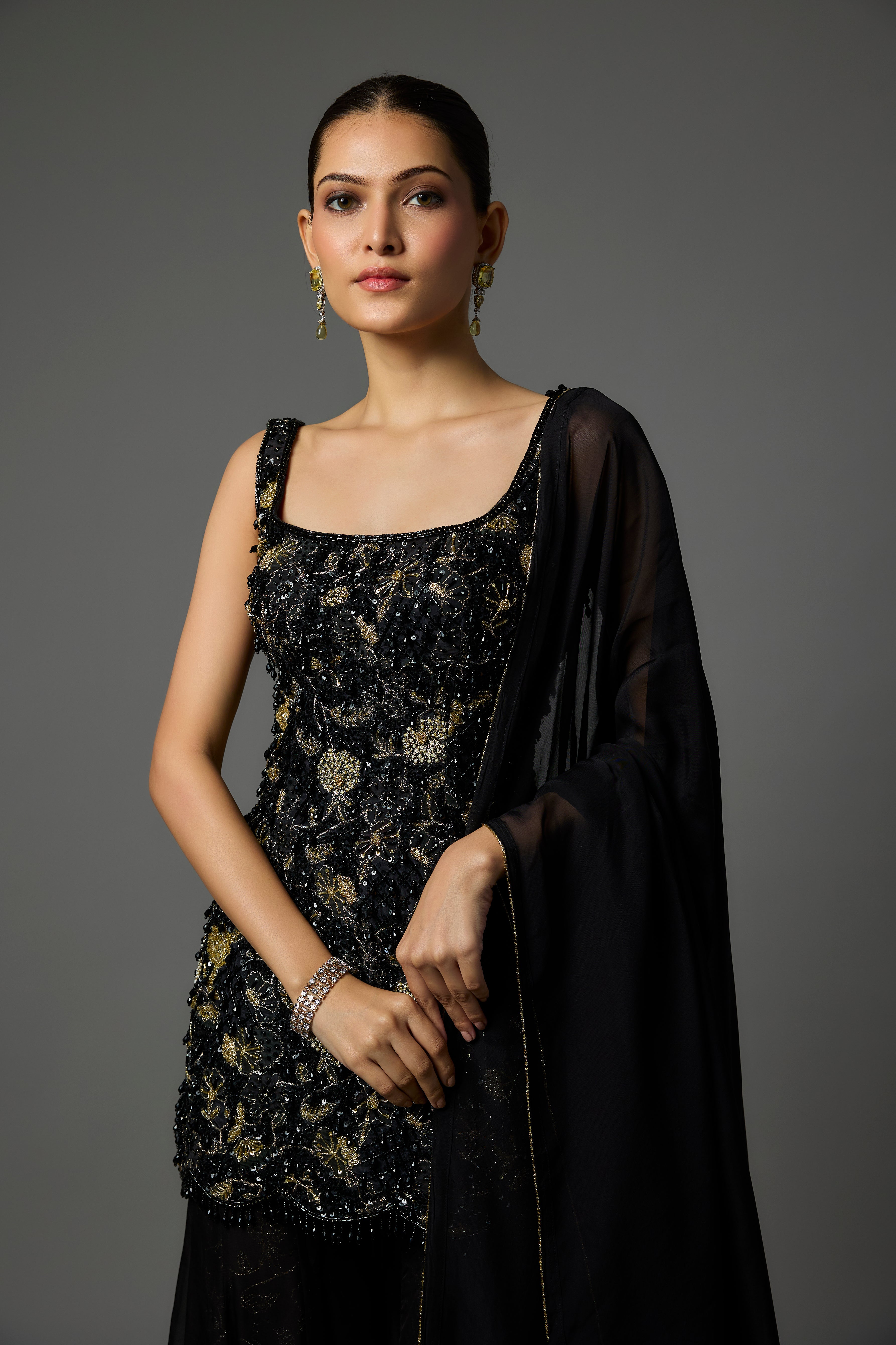 Black Sharara Set Adorned with Intricate Hand Embroidery