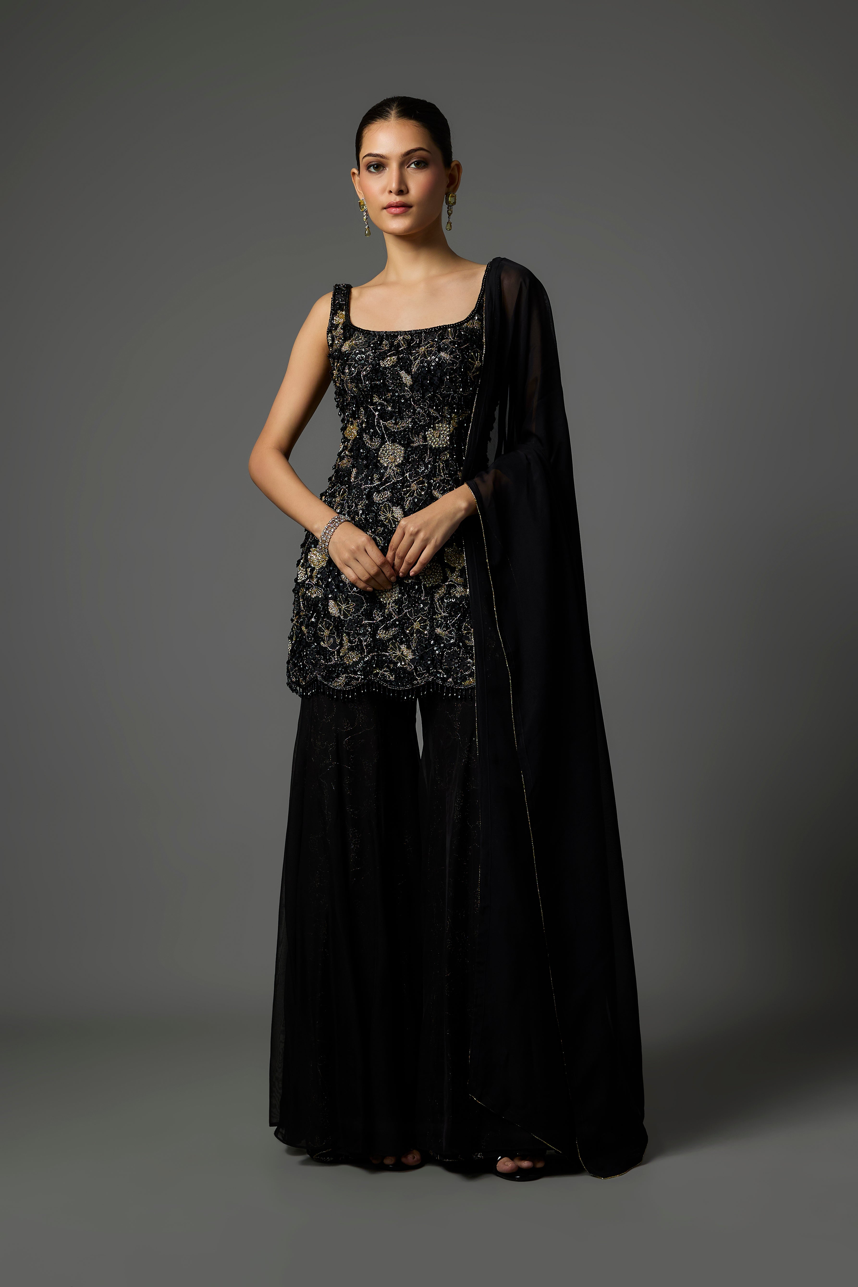 Black Sharara Set Adorned with Intricate Hand Embroidery